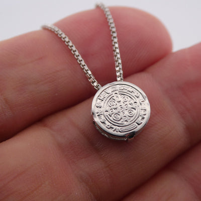 hold by hand front view benedict medal necklace